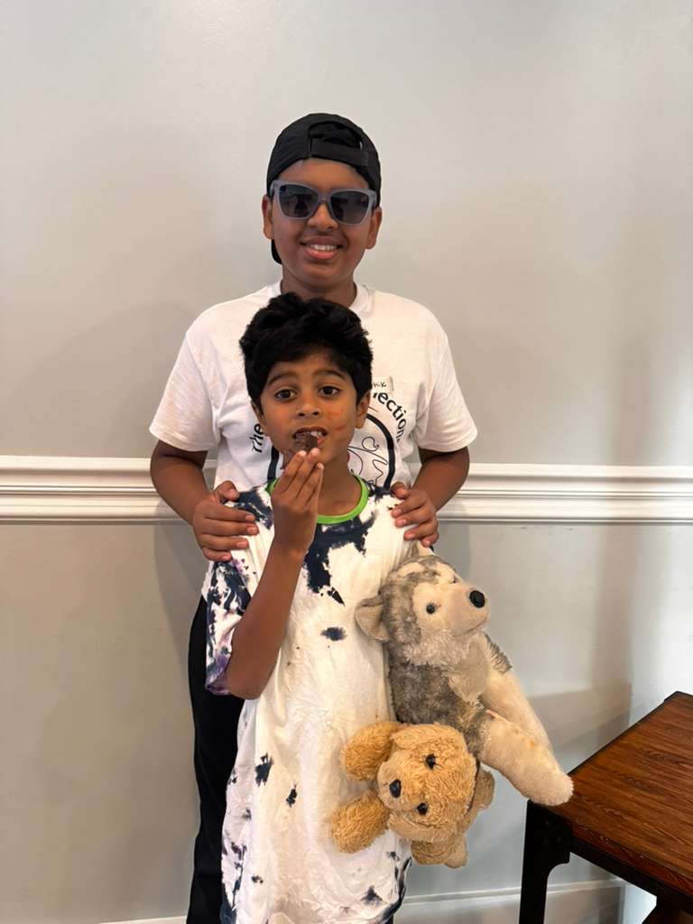 A volunteer and child connecting at a Special Connections program